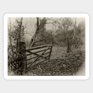 A rustic dilapidated farm gate. Sticker